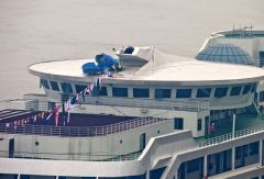 Whoops!  Chinese cruise liner collides into bridge!